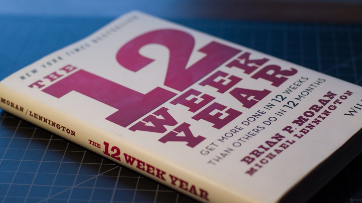 The 12 Week Year book on table