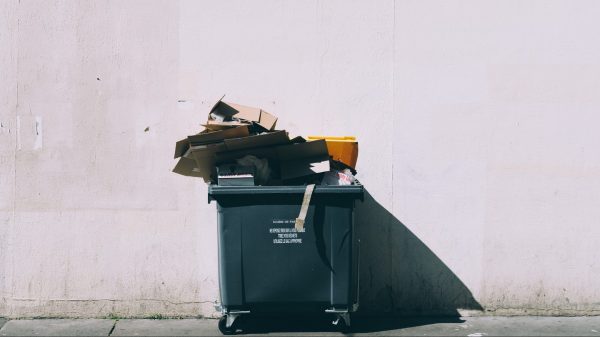 Waste dumpster with trash