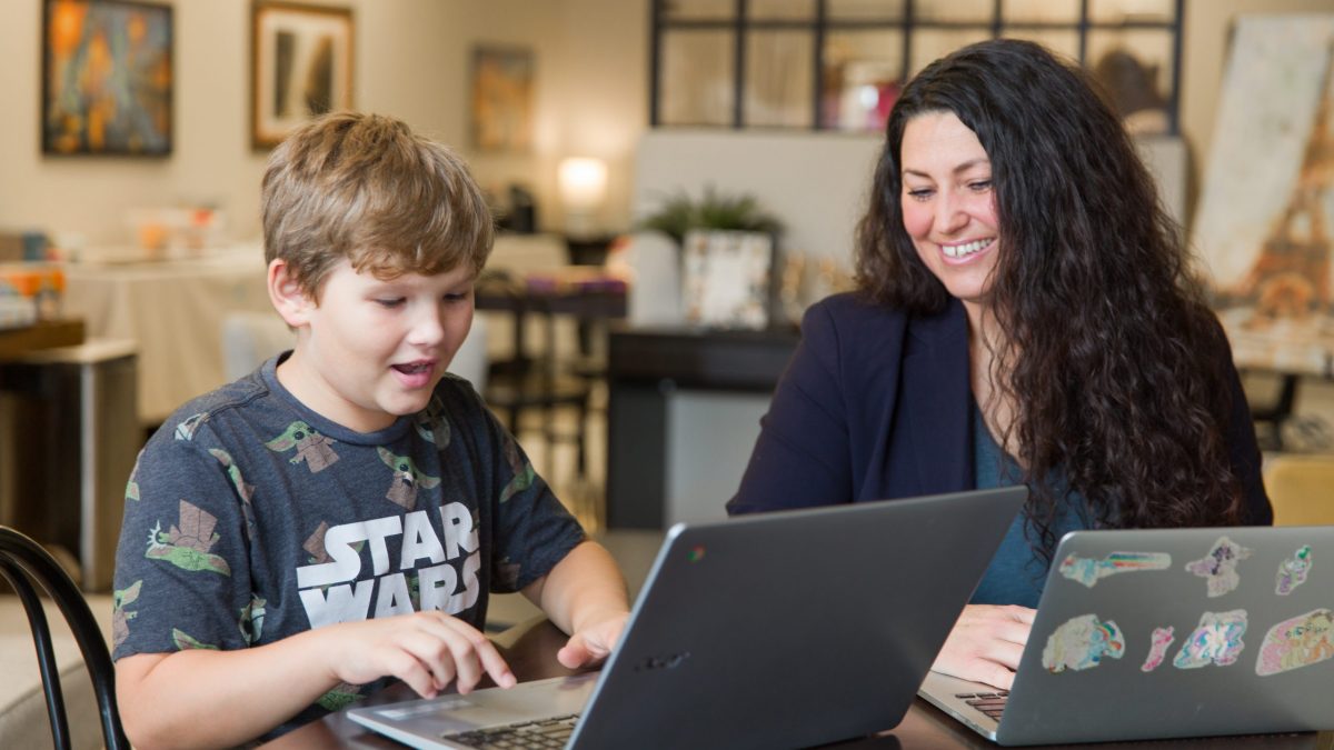 Owner Trista Boehmisch works with a student at Revise Collective. (Photo: <a href="https://edmondbusiness.com/author/brent-fuchs/">Brent Fuchs</a>)